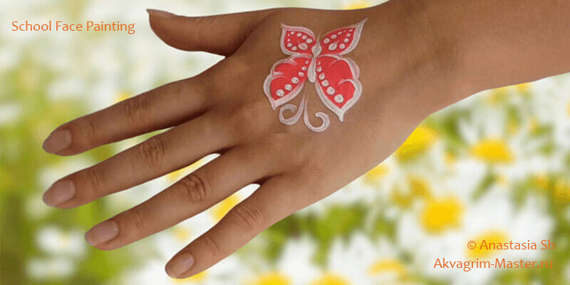 Рисунок бабочки на руке